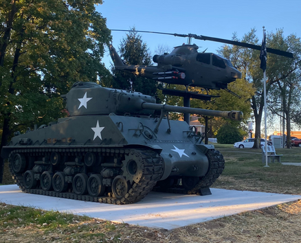 image of tank and helicopter