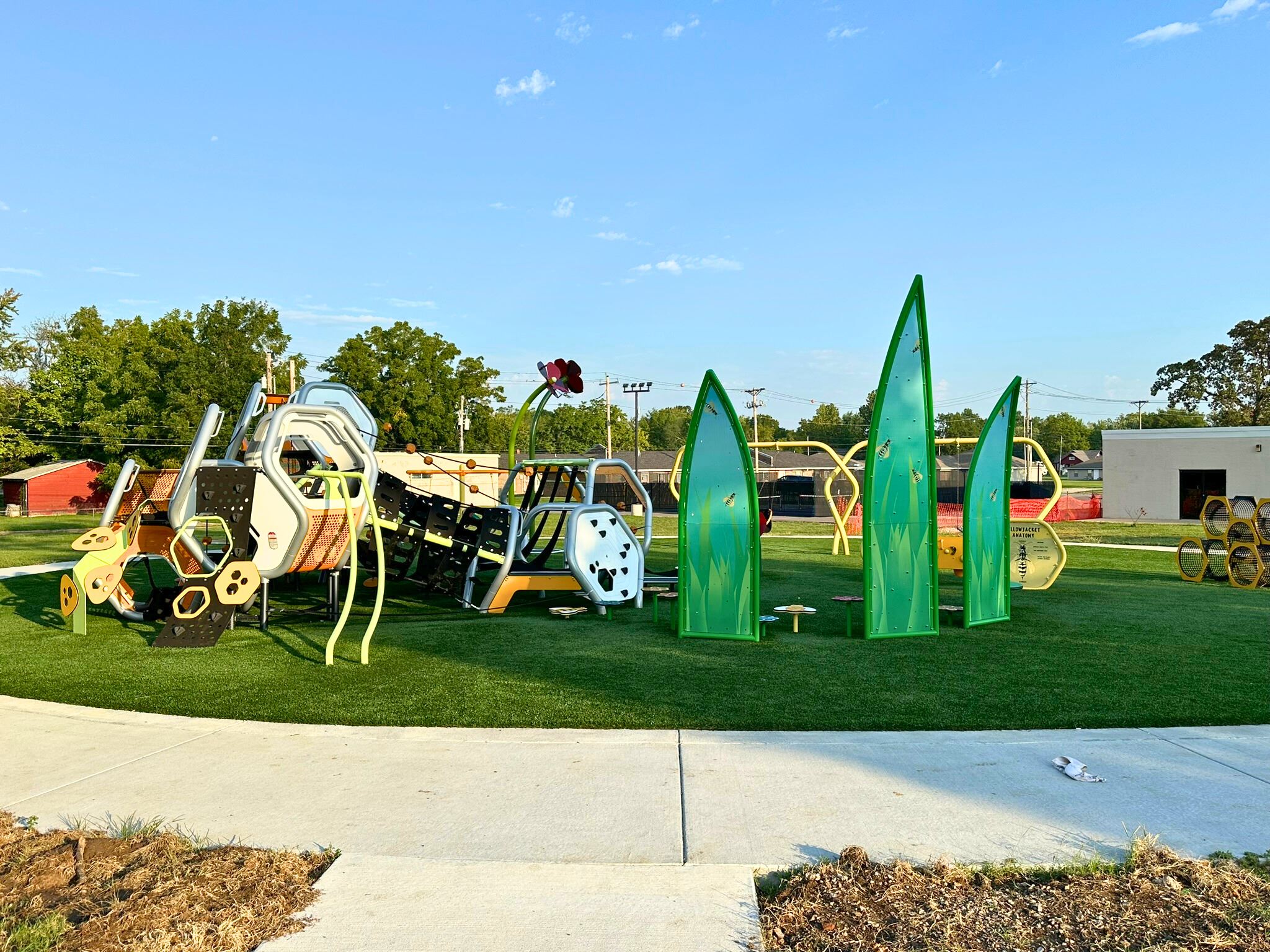 Wallace Park in Lebanon, showing the accessible playground, gazebo, and nearby courts.